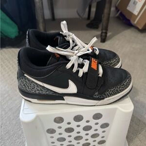 Nike Kids Black and White Sneakers with Orange Accents